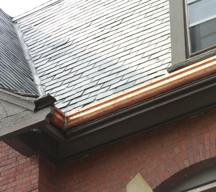 Completed asphalt shingle roof replacement on a residential home
